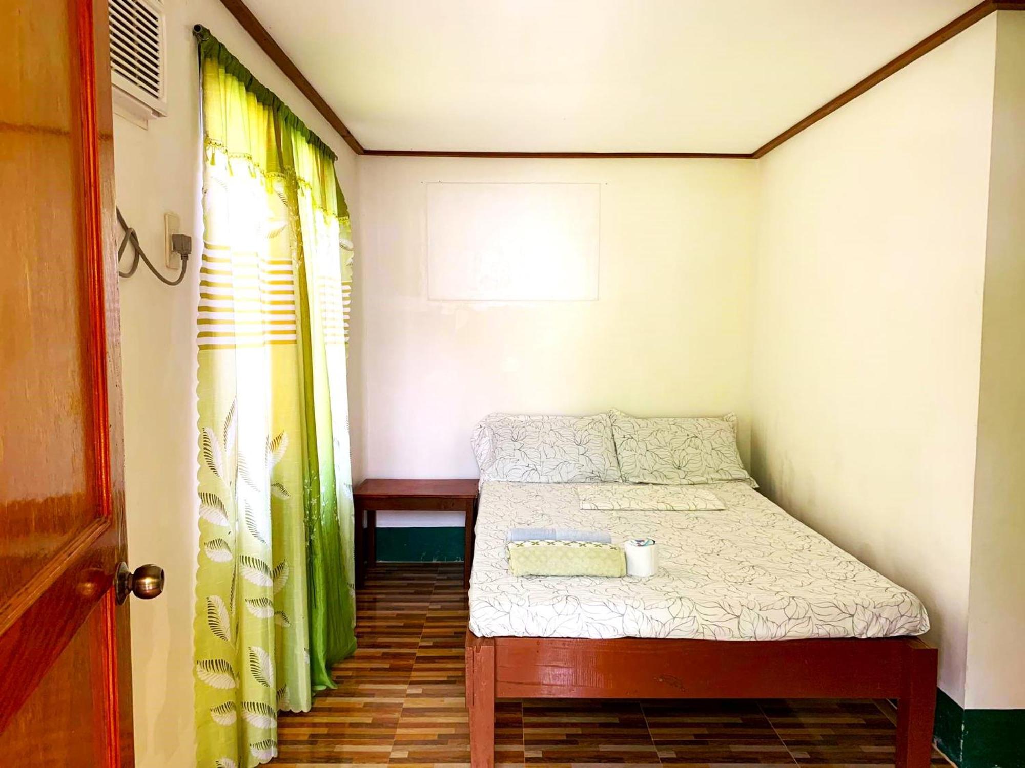 Divinagracia Cottages San Vicente  Bagian luar foto