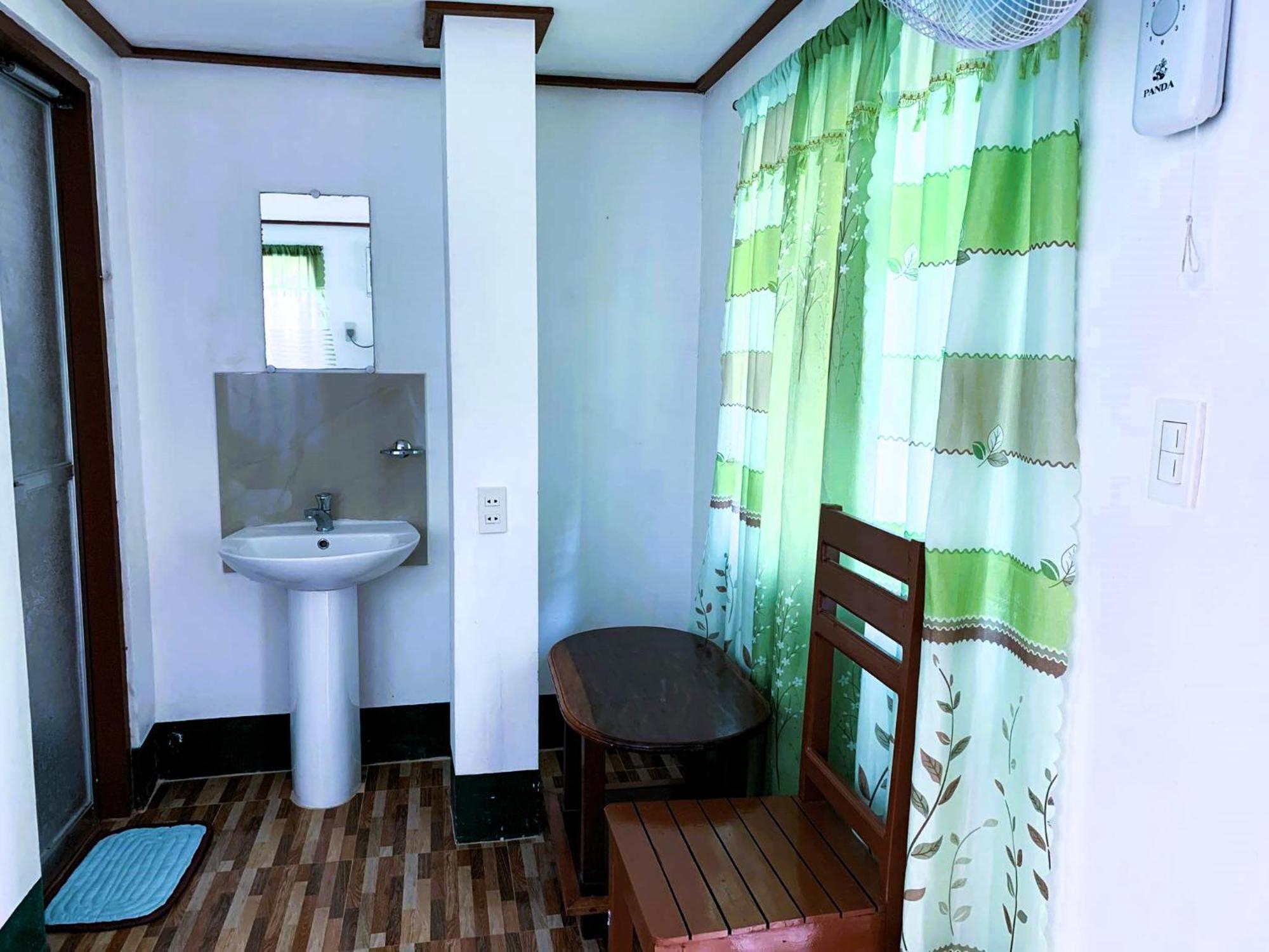 Divinagracia Cottages San Vicente  Bagian luar foto