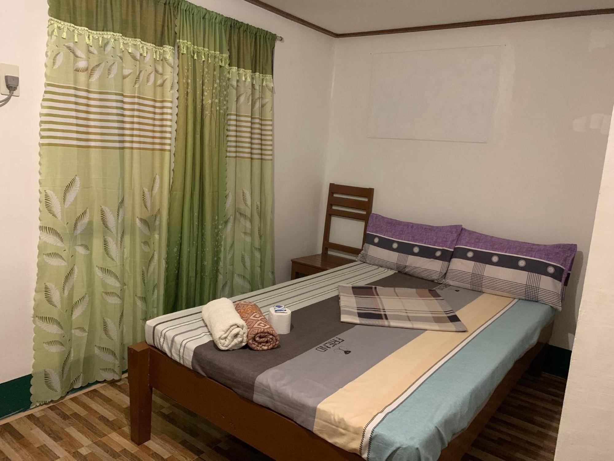 Divinagracia Cottages San Vicente  Bagian luar foto