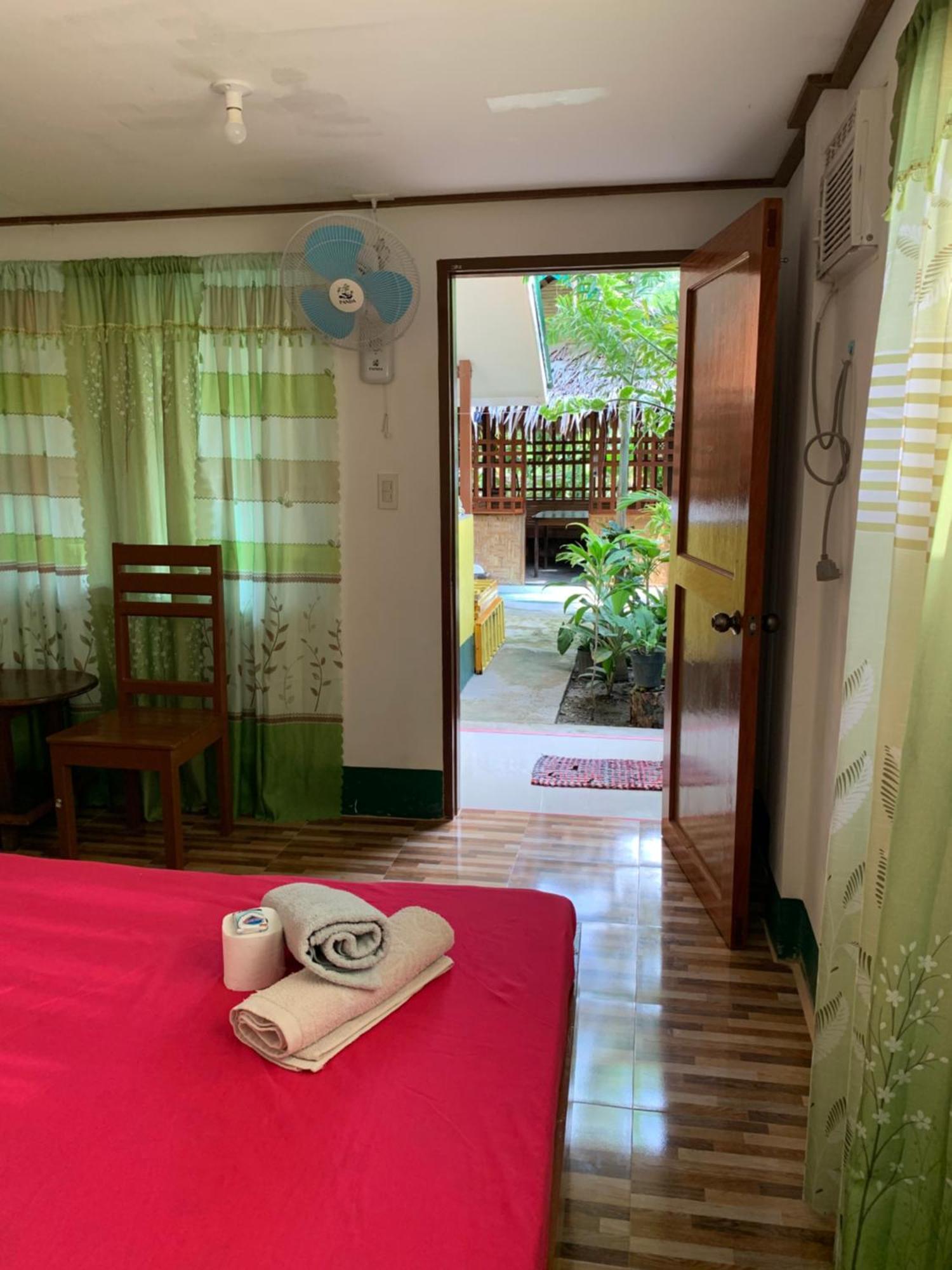Divinagracia Cottages San Vicente  Bagian luar foto